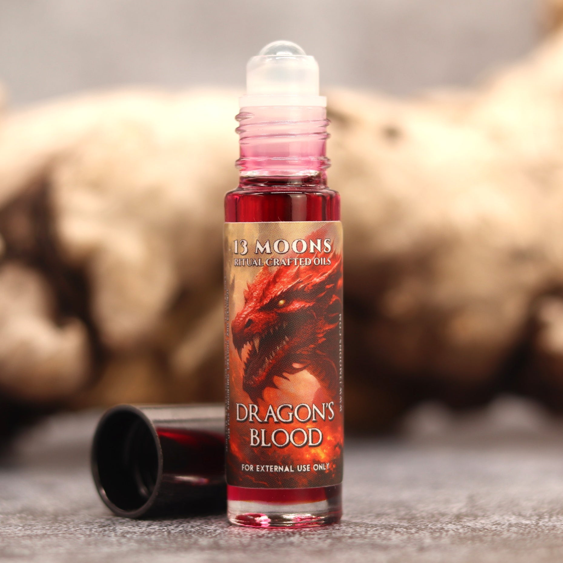 http://www.13moons.com/cdn/shop/products/dragons-blood-ritual-crafted-oil-by-13-moons-682502.jpg?v=1689956958