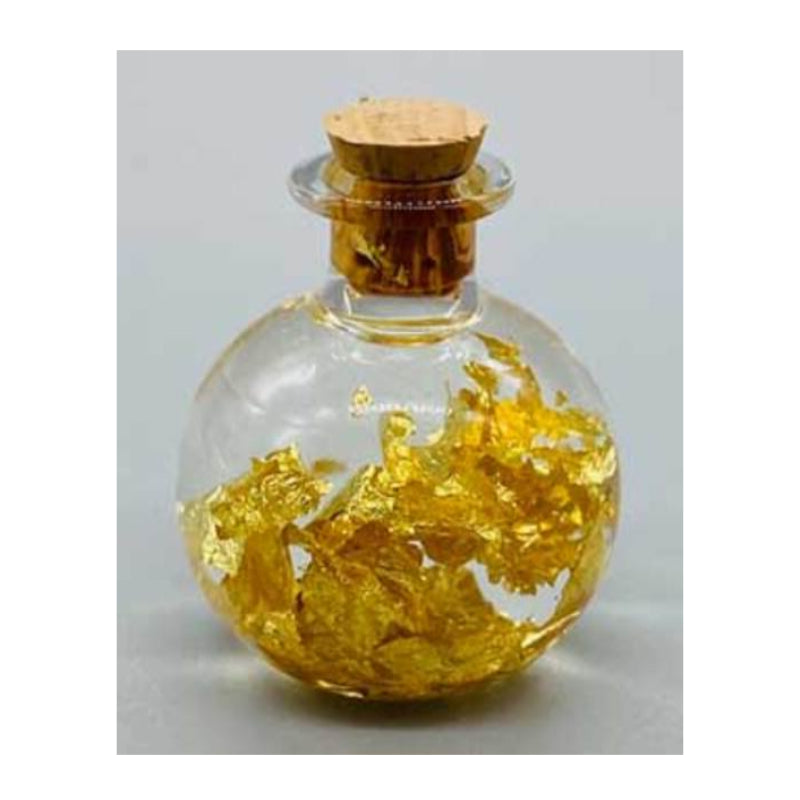 Gold Flakes in Glass Bottle